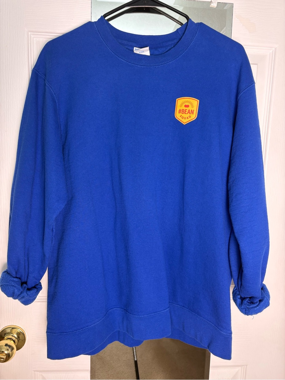 Port and Company Blue Crewneck Sweatshirt with Bush’s Baked Bean Logo